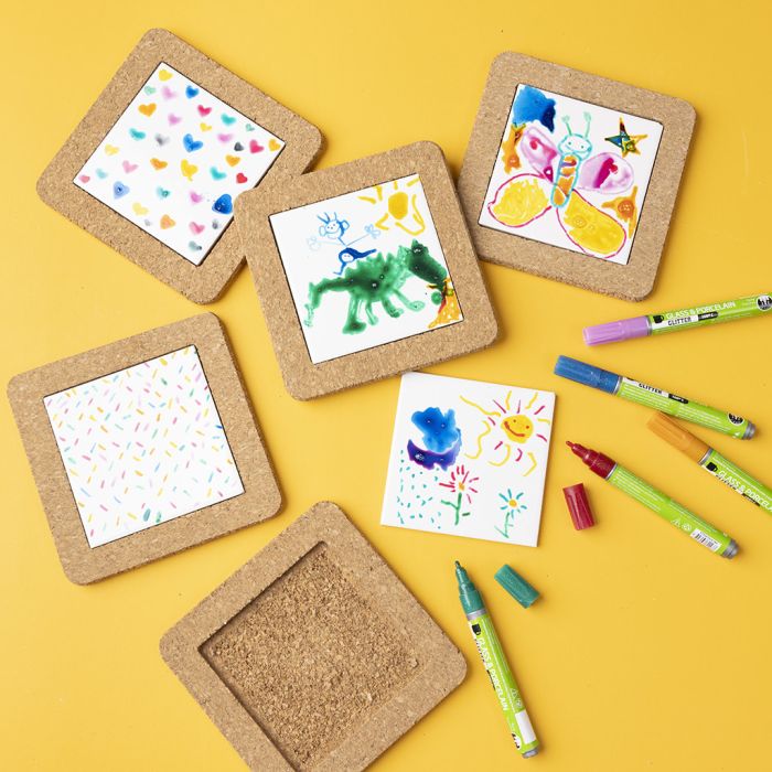 Posliinitusseilla koristellut lasinaluset