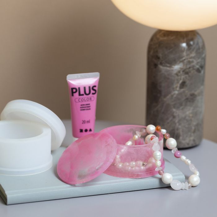 Läpinäkyvä purkki, jossa marmorointi