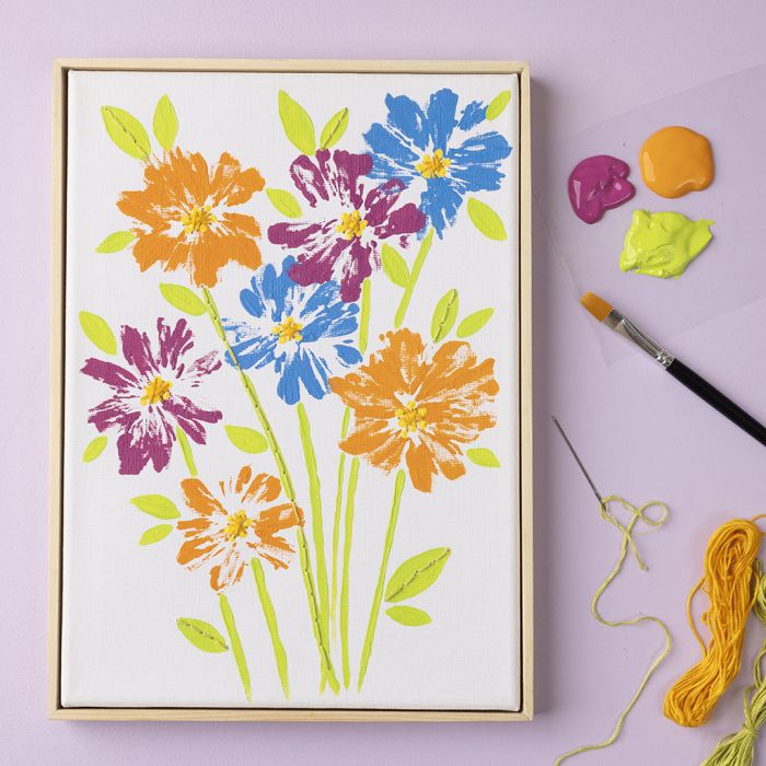 Kukkia taulupohjalla