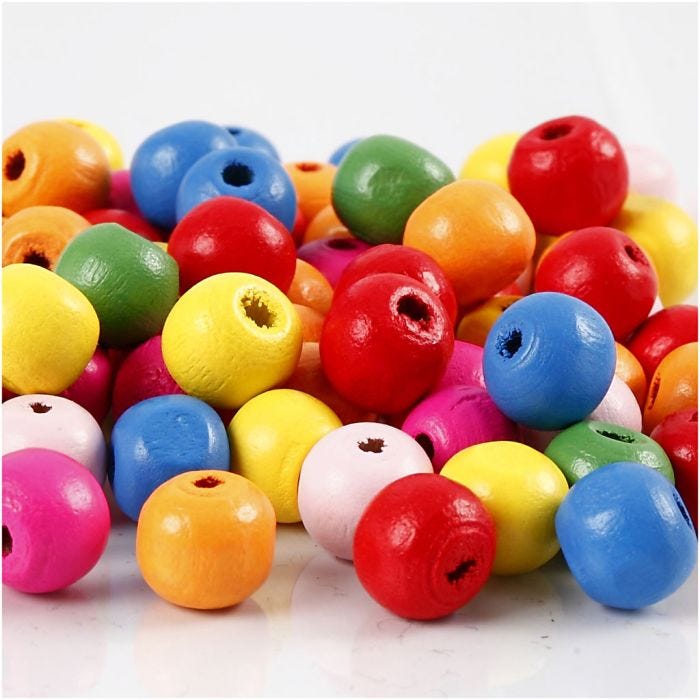 Puuhelmet, halk. 10 mm, aukon koko 2,5-3 mm, värilajitelma, 500 g/ 1 pss