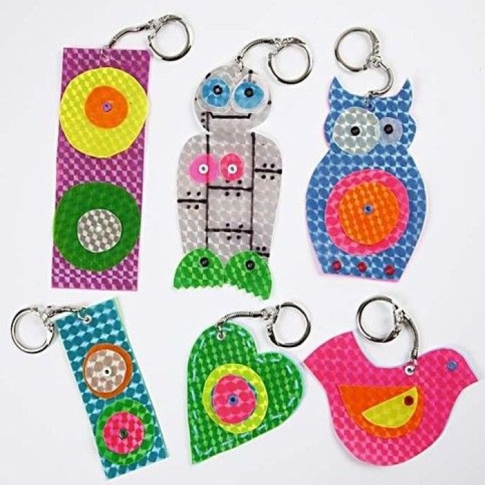 Neonmaskotti käsilaukkuun tai reppuun