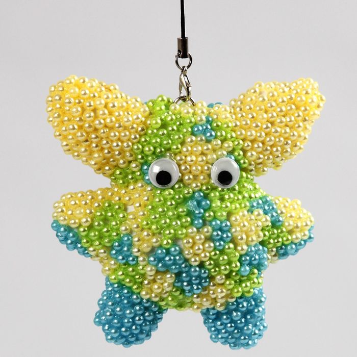 Helmiäismassalla päällystetty kangashahmo