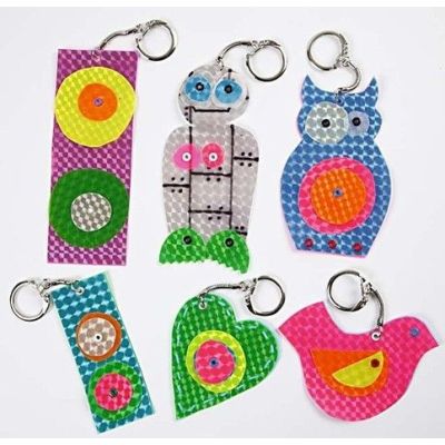 Neonmaskotti käsilaukkuun tai reppuun