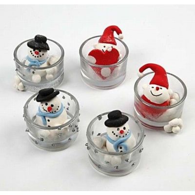 Silkkimassahahmoja tuikkulaseissa