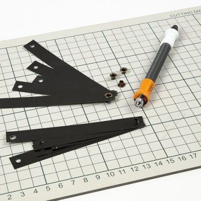 Ripustettavia koristeita paperisuikaleista