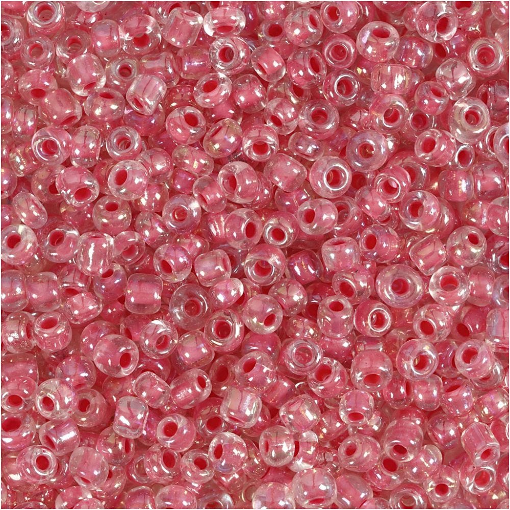 Rocaille-siemenhelmet, halk. 3 mm, koko 8/0 , aukon koko 0,6-1,0 mm, pinkki centre, 25 g/ 1 pkk